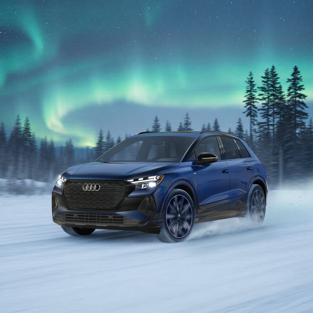 Left profile view of an Audi Q7 accelerating.